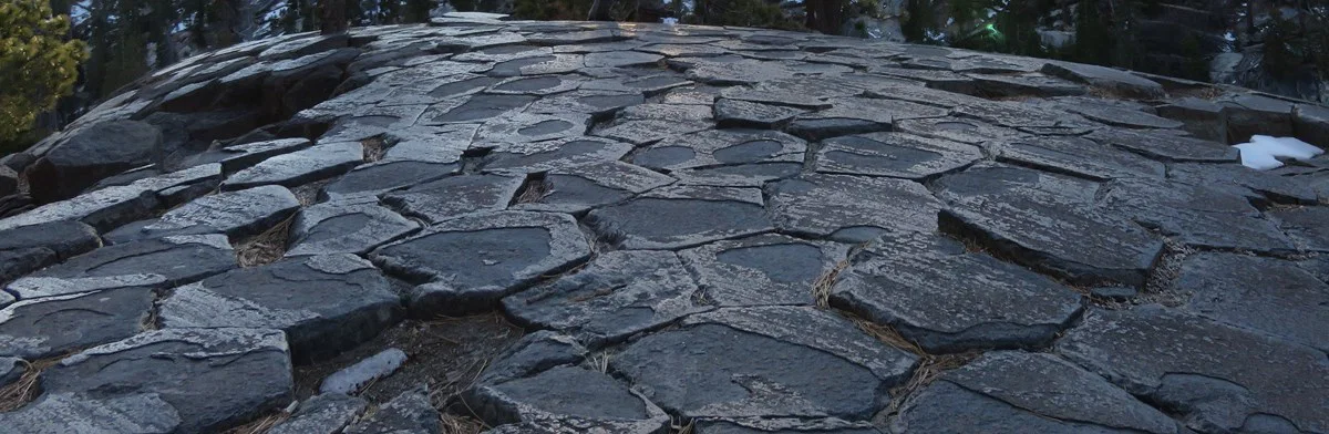 Polygonal tops of adjoining basalt columns form a natural stone pavement at Devils Postpile.
